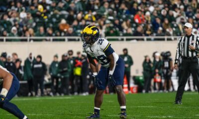 Benjamin Hall at the line of scrimmage waiting for the snap